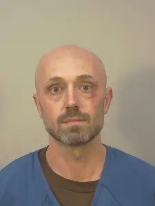 Wisconsin couple charged in alleged cyanide plot to kill ex-girlfriends; agents hospitalized during search