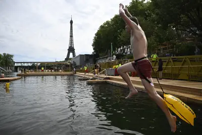 Joyful Parisians take a historic plunge into the Seine River after 100 years