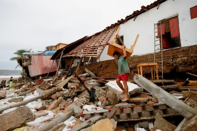 Mexico assesses damage from Hurricane Erick as rising rivers leave at least 1 dead