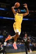 LeBron James needs just two words to hype up Bronny’s thunderous Lakers Summer League dunk