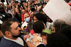 Anti-Israel protester Mahmoud Khalil makes emotional return home, embraces wife, and holds telling press conference with AOC