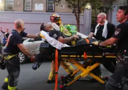 13 firefighters injured, 1 critically, as fast-moving blaze tears through 3 Bronx homes: ‘Like a movie’