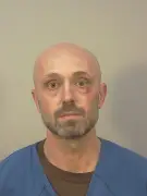 Wisconsin couple charged in alleged cyanide plot to kill ex-girlfriends; agents hospitalized during search