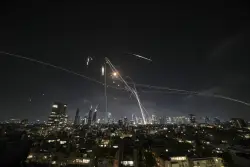While the Bombs Fall: What It’s Like on the Front Lines of the Israel-Iran War