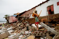 Mexico assesses damage from Hurricane Erick as rising rivers leave at least 1 dead