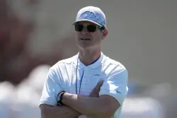 Jim Harbaugh added to lawsuit in Matt Weiss phone hacking scandal